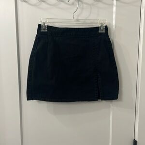 Black denim mini skirt